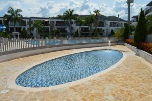 Bazén v ubytování Apartasol Santa Fe de Antioquia nebo v jeho okolí