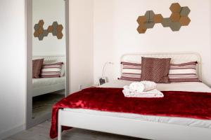 Giường trong phòng chung tại Graça Charming Apartment