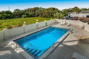 a swimming pool on the roof of a house at Emerald Shores #3006 in Laguna Beach