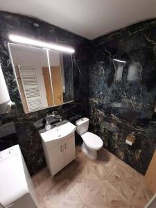 Koupelna v ubytování Apartmány Maksičky