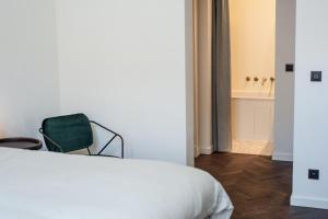 Postel nebo postele na pokoji v ubytování B'Guest Sleep & Retreat