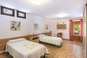 Postel nebo postele na pokoji v ubytování Sa Pedrera + 21 fotografií