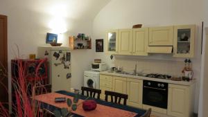 Kuchyňa alebo kuchynka v ubytovaní - B&B "Centro Antico" -