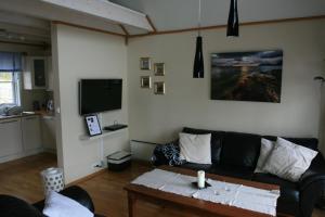 TV a/nebo společenská místnost v ubytování Tjeldsundbrua Maritim