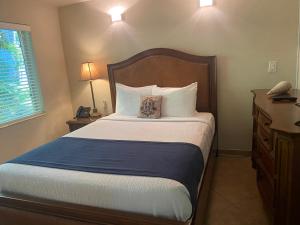 Postel nebo postele na pokoji v ubytování Casitas Coral Ridge