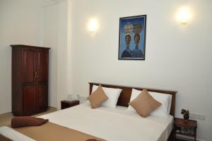 Postel nebo postele na pokoji v ubytování Walaw watta resort + 37 fotografií