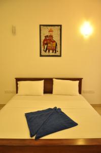 Postel nebo postele na pokoji v ubytování Walaw watta resort