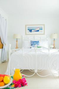 Cama ou camas em um quarto em Ocean Front Property - Villa 1 Aruba