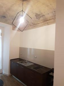 Kuchyň nebo kuchyňský kout v ubytování B&P La Gusteria
