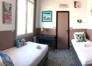 VILLA ZENITH Hostel - LA MAISON客房内的一张或多张床位