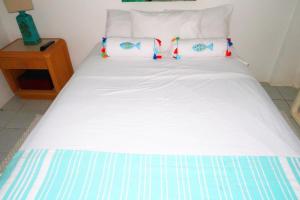 Cama ou camas em um quarto em Apartment Brazil Beach Front Paradise