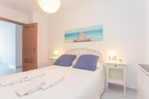 Posteľ alebo postele v izbe v ubytovaní Los Olivos Apartment Cullera