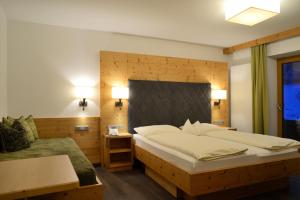 Posteľ alebo postele v izbe v ubytovaní Hotel Platzl