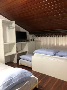 Un pat sau paturi într-o cameră la Winterville Resort em Gravatá/PE