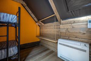 Postel nebo postele na pokoji v ubytování Camping Internazionale Etruria