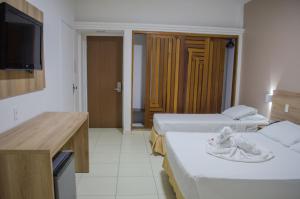 Postel nebo postele na pokoji v ubytování El Aram Beach Express