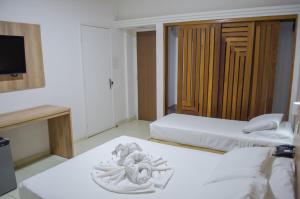 Postel nebo postele na pokoji v ubytování El Aram Beach Express
