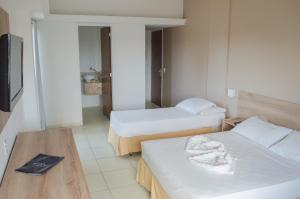 Postel nebo postele na pokoji v ubytování El Aram Beach Express