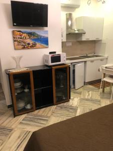 Kuchyň nebo kuchyňský kout v ubytování Casa Privata FOR YOU