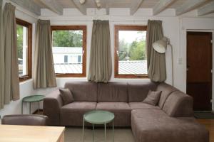 Istumisnurk majutusasutuses Basic vakantiehuisje op val d'Or