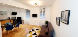 TV a/nebo společenská místnost v ubytování Superbe Appartement de 50m2