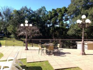 Um jardim em Samuara Hotel Caxias do Sul