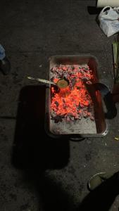 a pan filled with red peppers on the street at Hotel Wiva in Istanbul