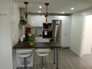 Kuchyň nebo kuchyňský kout v ubytování Apartamento céntrico recién reformado