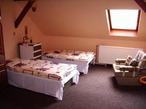 Postel nebo postele na pokoji v ubytování Pohodový apartmán s terasou