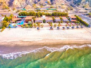 an aerial view of the beach at a resort at Apart Hotel Las Cherelas in Canoas de Punta Sal