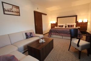 Posteľ alebo postele v izbe v ubytovaní Hotel Sladovna