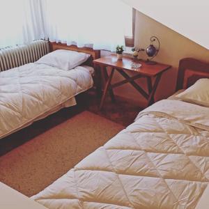 Postel nebo postele na pokoji v ubytování Charoula Pavliani Fthiotidas