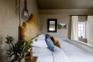 Letto o letti in una camera di Ship Inn Stanley