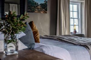 Letto o letti in una camera di Ship Inn Stanley