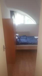 Łóżko lub łóżka w pokoju w obiekcie Bliss apartment