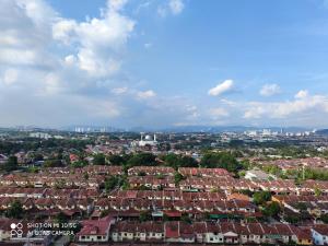 an aerial view of a city with houses at EVO Soho Suites, Bangi in Kampong Sungai Ramal Dalam