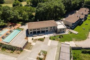 an overhead view of a building with a swimming pool at Oniropetra Boutique Hotel in Karpenisi