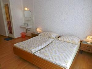 Postel nebo postele na pokoji v ubytování Pension Schönblick