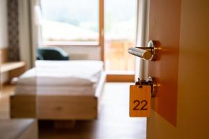 Voodi või voodid majutusasutuse Hotel garni Kranzbichlhof toas