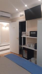 TV a/nebo společenská místnost v ubytování Pescara Centro luxury suite II Deluxe Rooms
