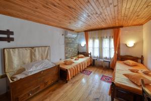 A bed or beds in a room at Villa Fiikova