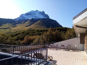 a view of a mountain from the balcony of a house at Residence Orso Bianco in Pietracamela