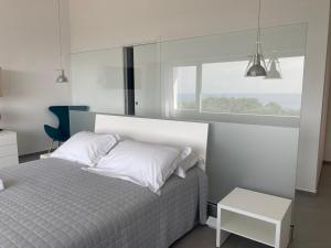 Posteľ alebo postele v izbe v ubytovaní Il Mare di Giù Boutique Guesthouse