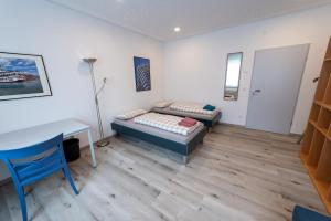 Stadthaus Seeblick G5 - Hostel客房内的一张或多张床位