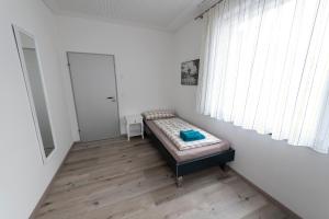 Stadthaus Seeblick G5 - Hostel客房内的一张或多张床位