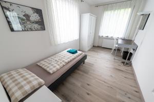 Stadthaus Seeblick G5 - Hostel客房内的一张或多张床位