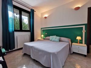 Postel nebo postele na pokoji v ubytování B&B Gianni e Pia