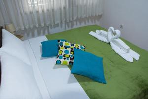 Postel nebo postele na pokoji v ubytování Apartment Elmari