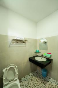 Kylpyhuone majoituspaikassa Thanh Ngọc Motel