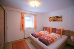 A bed or beds in a room at Mountainpeak